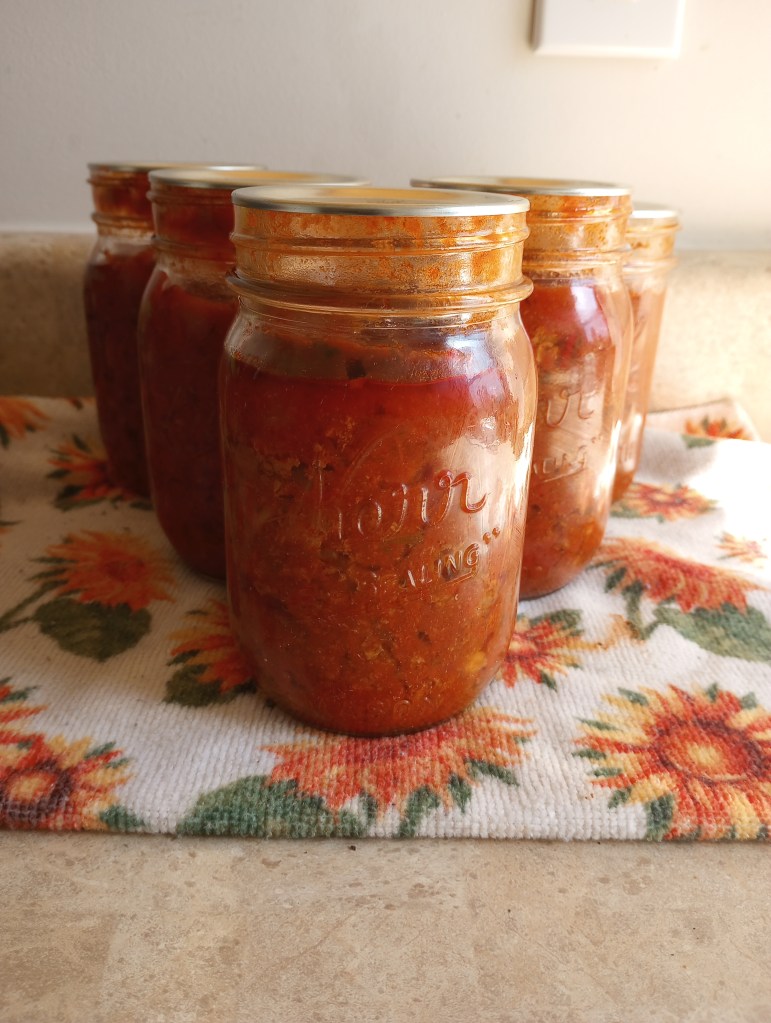 beefy bolognese sauce in Mason jar